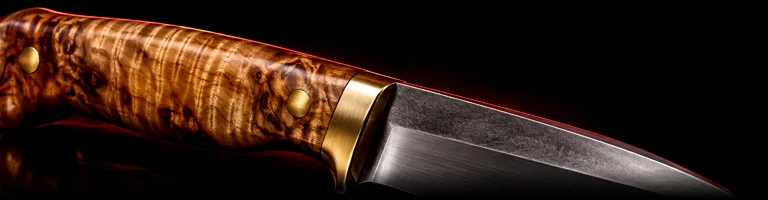 Illustrative studio render of a bushcraft fixed blade with figured maple handle, not the actual model